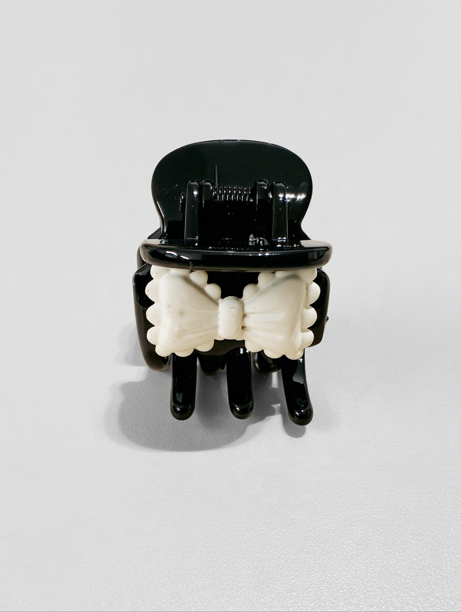 Black Claw Clip with Cream Enamel Bow